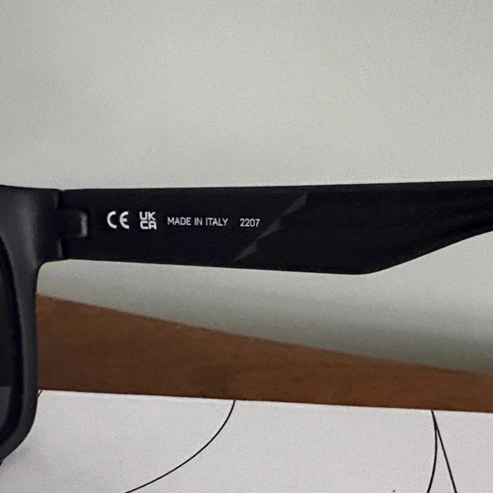Nike Cruiser Black Frame Sunglasses with Red Mirror Lenses